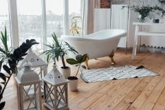 Bathing Room Interior Design. Cozy Empty Modern Bathroom Background With White Bathtub And Panoramic Windows