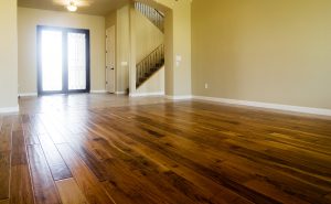  New home with beautiful hardwood flooring in living room area 