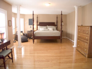New light hardwood flooring in master bedroom